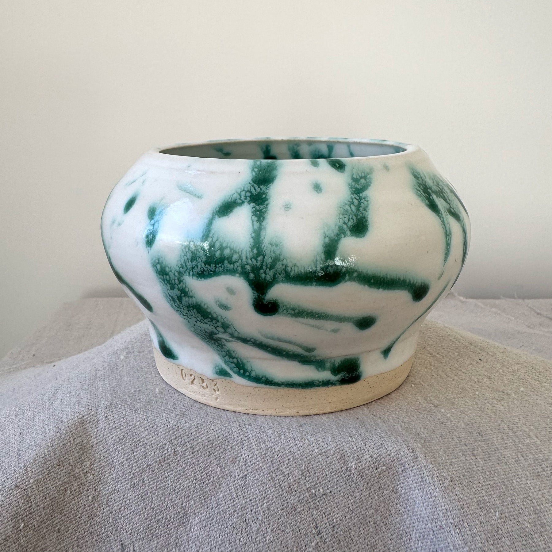 ceramic green and white splatterware container