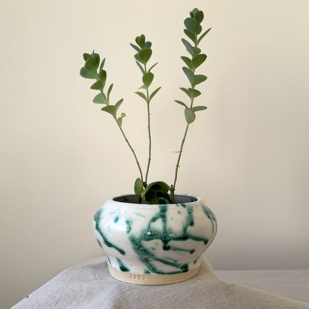 ceramic green and white splatterware container